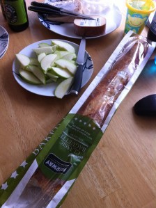 Fresh bread and sliced apples